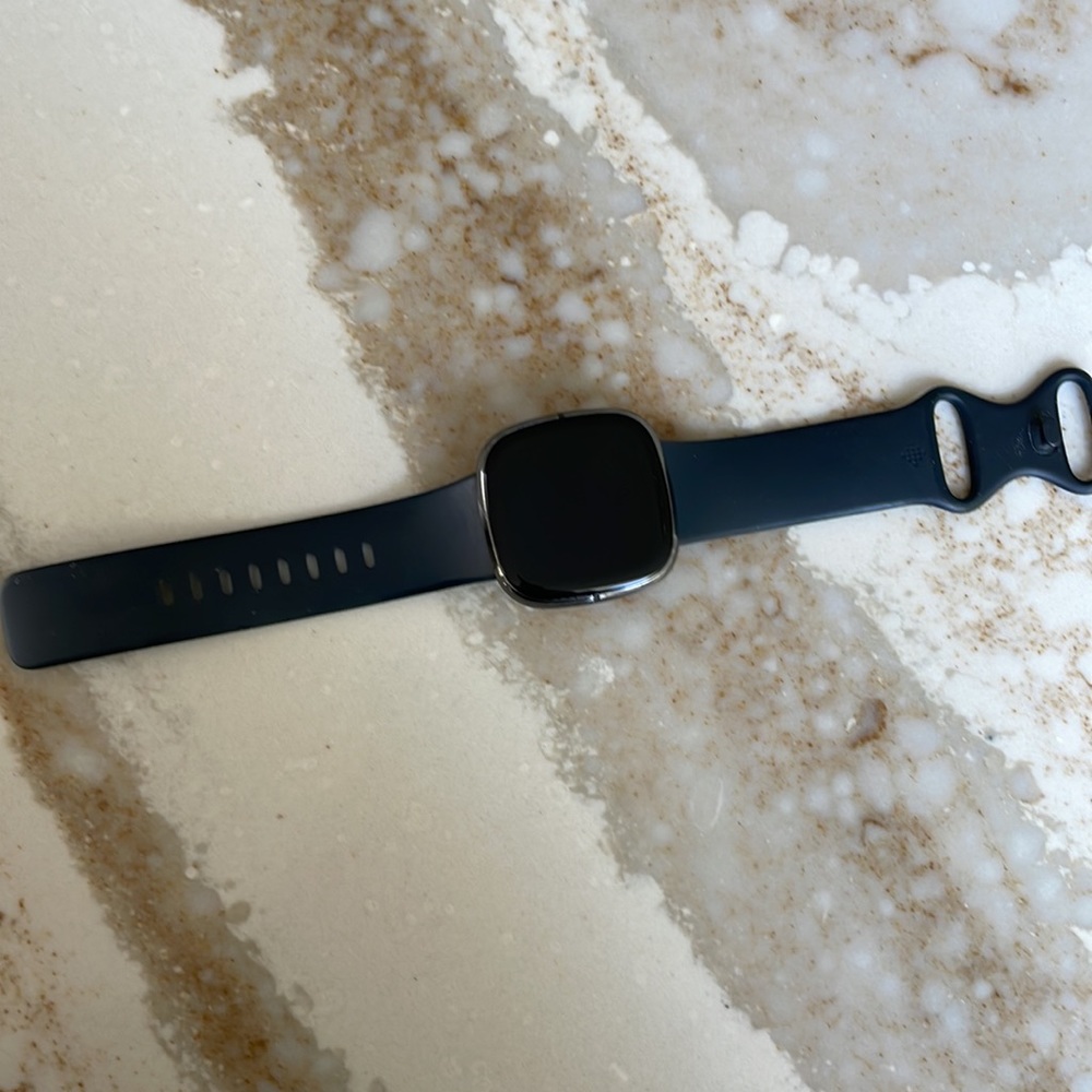 Fitbit Sense with usb charger